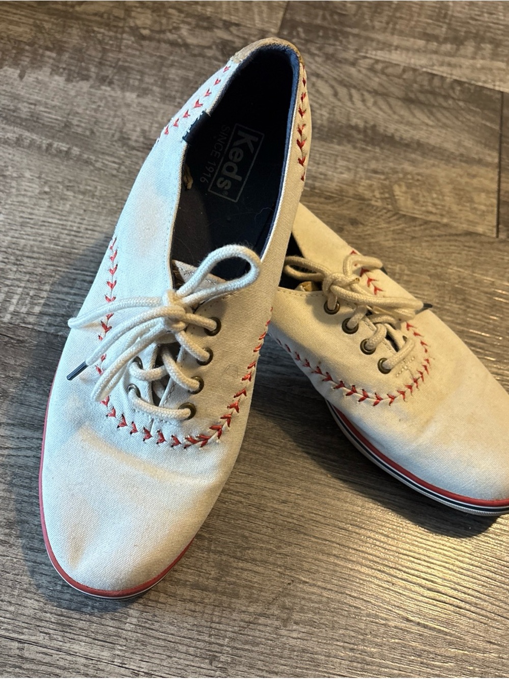 Keds Cream Canvas Sneakers with Red Stitching
